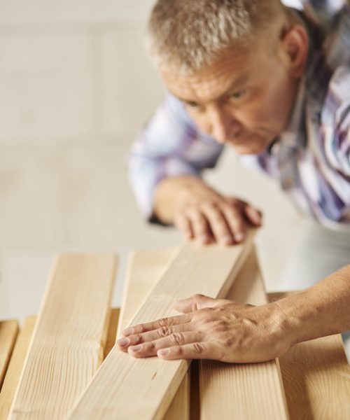 Very hard working man meausers another planks